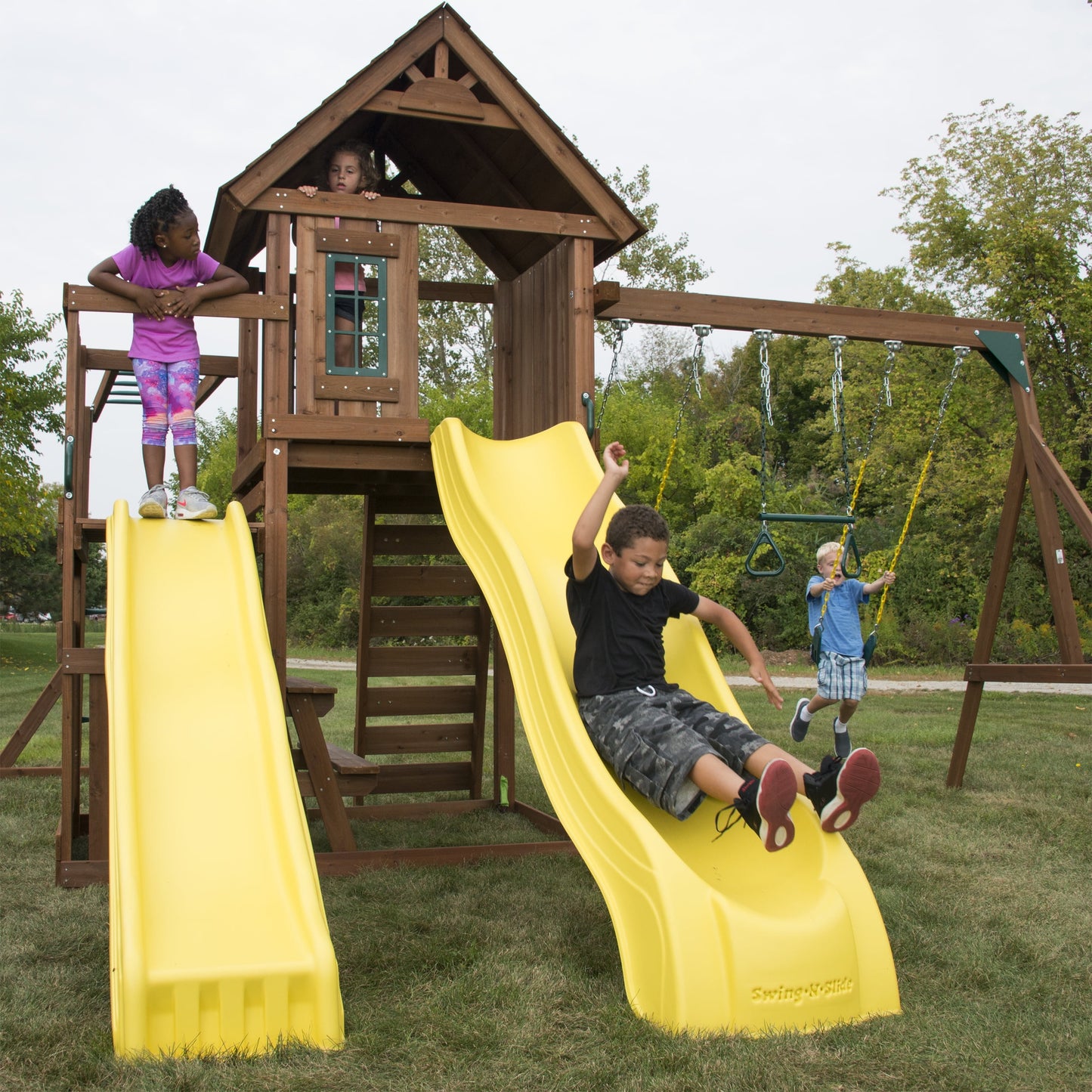 Swing-N-Slide Timberview Wooden Backyard Swing Set with Two Yellow Wave Slides, Wood Roof, Swings, and Monkey Bars